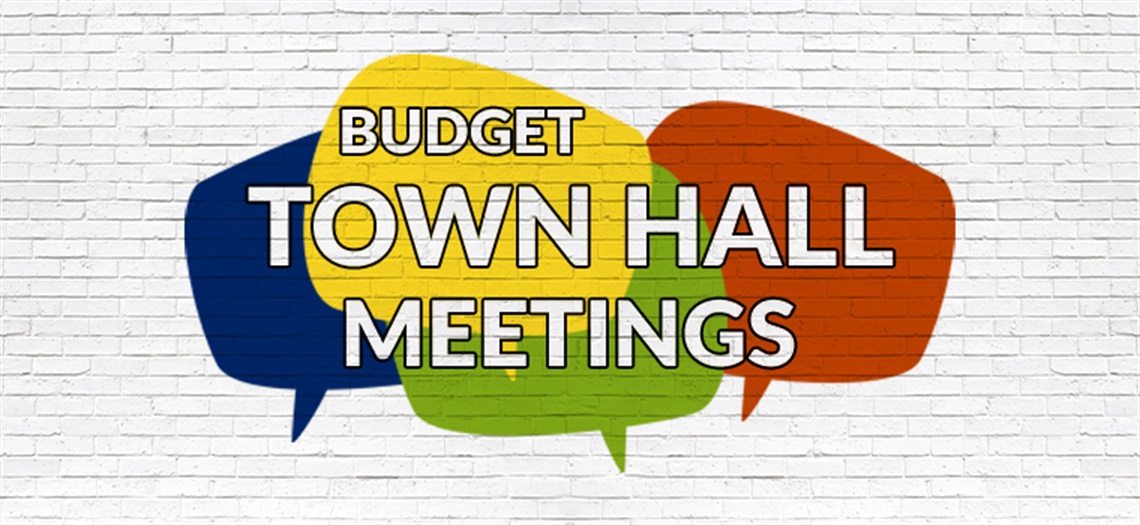 Budget town hall graphic with words on a brick wall