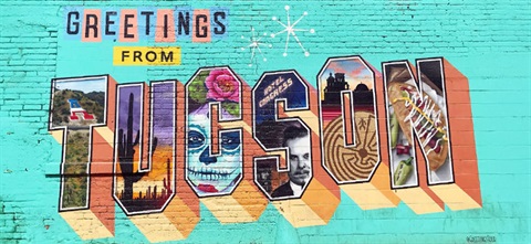 Mural with many colors and images that says 