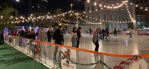 Skaters on outdoor ice rink