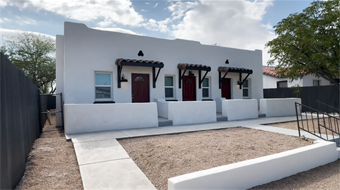White-Triplex-with-Red-Doors-1.png