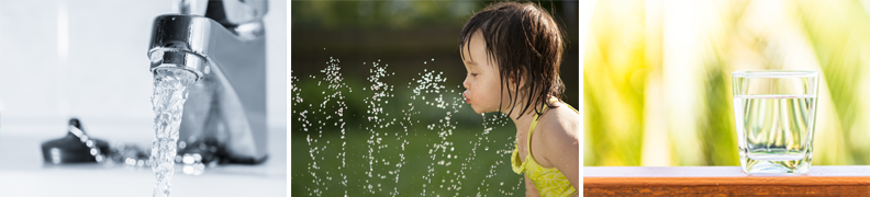 toddler drinking from fountain