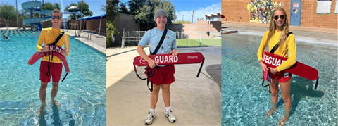 Three lifeguards in yellow shirts and red shorts holding rescue tubes at a public pool on a sunny day.